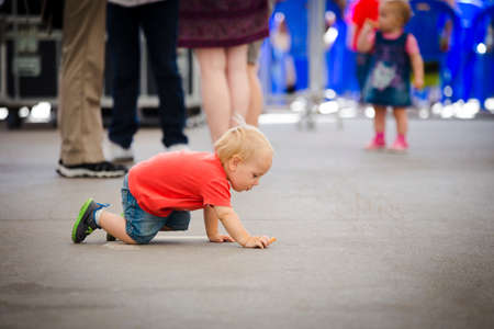 19 june 2015 unidentified child without supervision crawls, Chisinau, Moldovaのeditorial素材