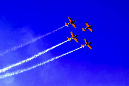 air show, small planes allowed smoke in the air showing the air acrobatics