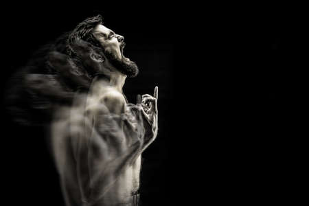 emotionally expressive photograph of a screaming bearded man, an angry pain cry black and white...