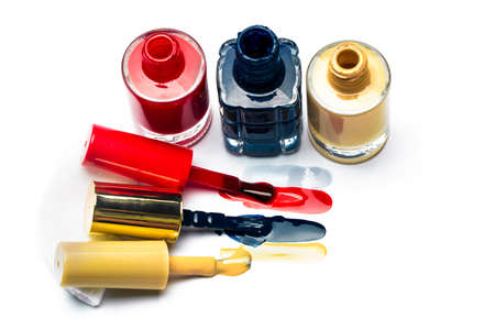 three  of an open varnish on a white background, colored lines near brushes