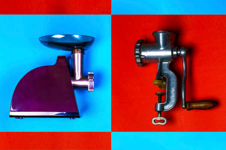 two meat grinders on a bright background, the concept of old age and a generation change, flat lay...