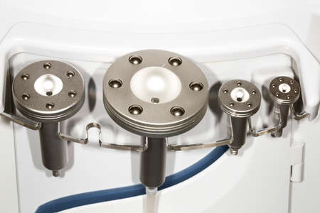 white cosmetology equipment close-up with metal nozzles, background image, close-upの写真素材