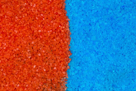 blue and orange bath salts, background image, close-up textureの写真素材