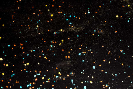 abstract background image of crystals and colored dust, the concept of space and non-existing...
