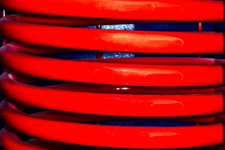 red spiral tube, background image, close-up photoの写真素材