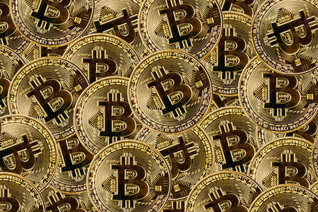 background of gold bitcoins, close-up photoの写真素材