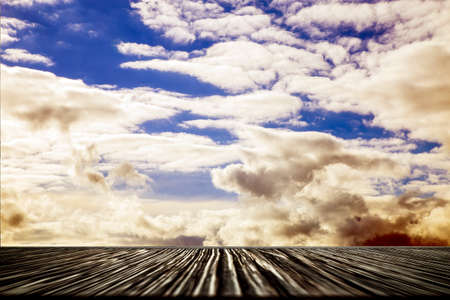 wooden floor and beautiful sky at sunset, background image, freedom conceptの写真素材