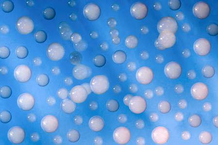 soap bubbles with smoke on blue background