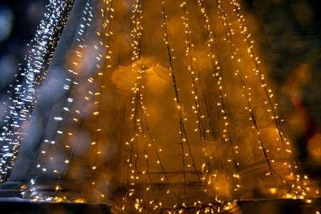Blurred or defocused image of christmas garland lights background image