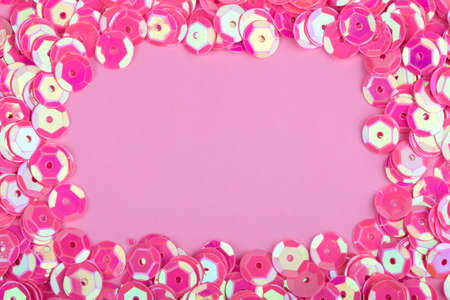 frame from  beads for decoration on a pink backgroundの写真素材