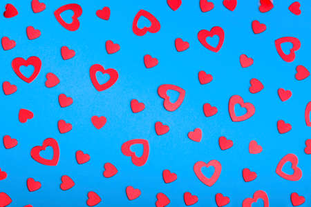 decorative red hearts on a blue backgroundの写真素材