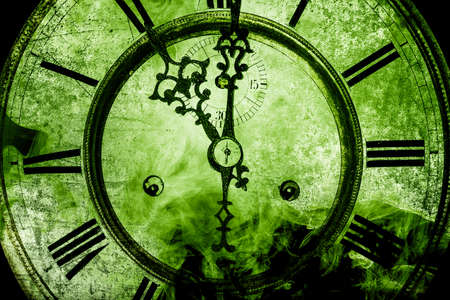 vanishing clock becoming smoke with roman numerals. concept time is transientの写真素材