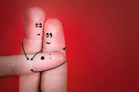 family of fingers with babies on handsの写真素材