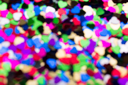 Blurred or defocused image of decorative hearts of different colors, background imageの写真素材