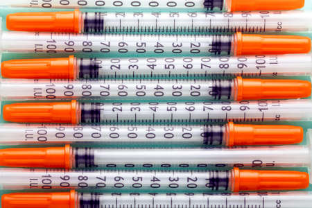 background of medical insulin syringesの写真素材