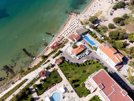 aerial shooting of the resort in Sveti Vlas, sea view and hotel residential buildings with swimming pools on the territoryのeditorial素材