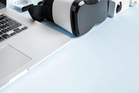 set of modern gadgets on a blue backgroundの写真素材