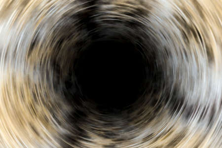 Blurred or defocused image of dark circle in the form of a portal