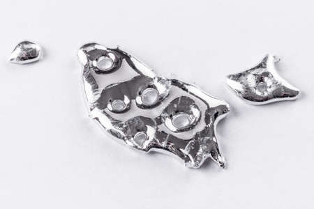 liquid metal with round holes, image on white background
