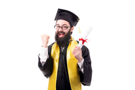 graduate with a diploma in hand, rejoices at successful completion of studies, isolated on white backgroundの写真素材