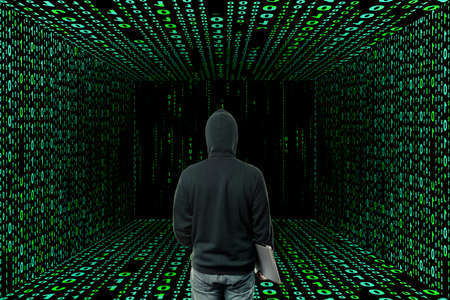 programmer or hacker in cyber reality room of binary code, mixed mediaの写真素材