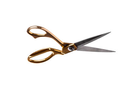 golden tailor scissors, isolated on white backgroundの写真素材