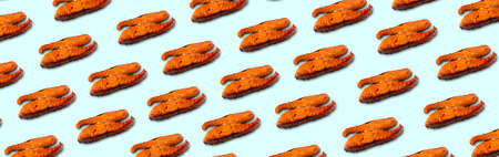 grilled salmon fishes, panoramic image over blue backgroundの写真素材