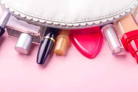 Set of decorative cosmetics on light pink backgroundの写真素材