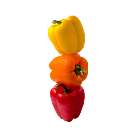 Peppers. Paprika tower isolated on white background. Food concept.