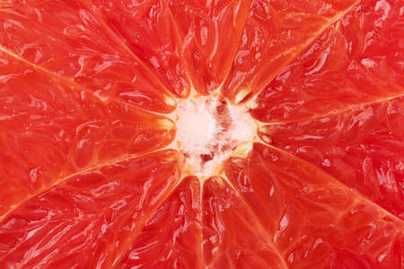 Grepefruit pulp close up. Citrus fruit backgroundの写真素材