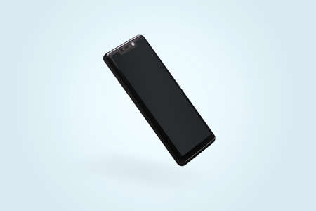 Levitating modern black metalic mobile  on blue background.の写真素材