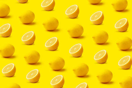 Lemon pattern on yellow backgroundの写真素材