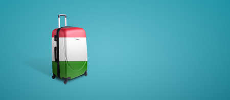 Travel suitcase with the flag of Italy. Holiday destination, panoramic mock-up over blue backgroundの写真素材