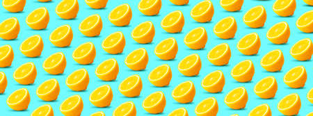 Fresh lemon pattern on a light  blue background, panoramic imageの写真素材
