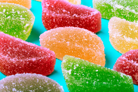 image of colorful jelly candies on blue backgroundの写真素材