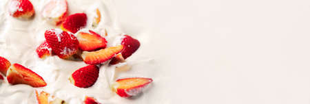 strawberries in sour cream, panoramic mock-up with space for textの写真素材