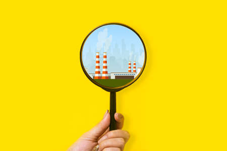the city emits toxic fumes, the search for environmental pollution, the concept of ecology problemsの写真素材