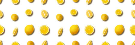 the lemon background on white with shadows, panoramic citrus imageの写真素材