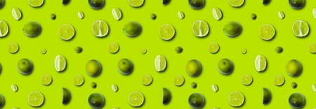 fresh slices lime on a light green background
