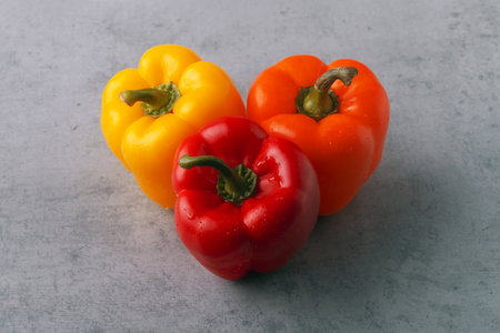 colorful pepper paprika on concrete background