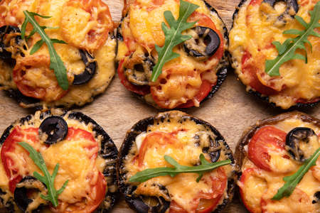 pizza portobello mushrooms on wooden background, proper nutrition concept