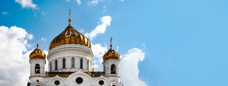 The Cathedral of Christ the Savior over blue background with clouds, panoramic layout, Moscow, Russia,の写真素材