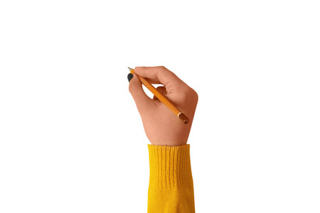 Woman's hand holding a pencil isolated on white backgroundの写真素材