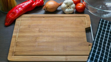 Top view of cutting board, prepared for cookingの写真素材