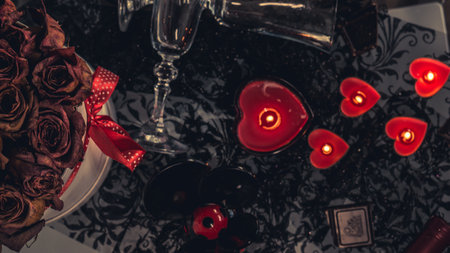 valentine background of wine, chocolate and red candlesの写真素材