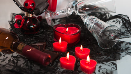 valentine background of wine, chocolate and red candlesの写真素材