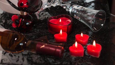 valentine background of wine, chocolate and red candlesの写真素材