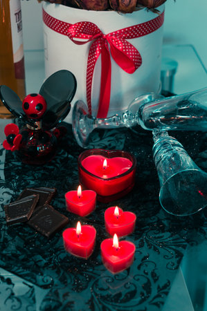 valentine background of wine, chocolate and red candlesの写真素材