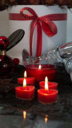 valentine background of wine, chocolate and red candlesの写真素材
