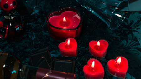 valentine background of wine, chocolate and red candlesの写真素材